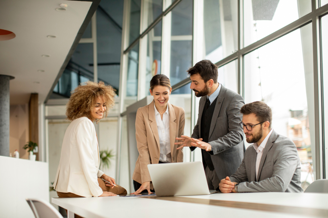 Business professionals reviewing information together in an office